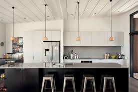 Not the wall color but love this kitchen for the loft. Family Legacy Hahei Beach House Architecture Now