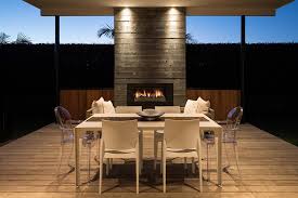 Gas tabletop fire bowls, luxury outdoor fire pits, contemporary led wall mount fireplaces, and dual flame wall hanging modern fireplace: Gas Vs Wood Tips For Choosing The Right Outdoor Fireplace Stoke Fireplace Studio