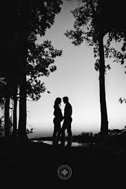 Black And White Couple Maternity Shoot Romantic Dramatic Black And White Silhouette Of Couple In The Wood Maternity Photography Poses Maternity Photography Fall Maternity Photography Poses Outdoors