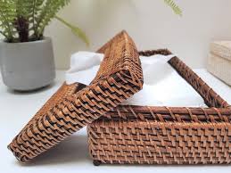 Please measure the tissue boxes you are using and compare with the measurements of the tissue box cover hereafter to verify that one will fit into the other. Rattan Tissue Box Cover Something Nude