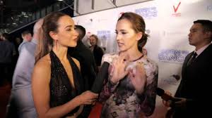 Lou is at the red carpet at the Born to Dance premiere