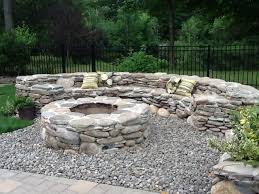 The slate gray coloring and texture accent the yellow stones below beautifully. 12 Natural Stone Fire Pits Ideas Stone Fire Pit Fire Pit Backyard Outdoor Fire Pit