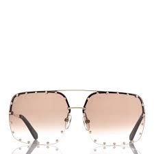 Available in a rainbow of different lens colors, these stylish sunglasses are decorated with iconic studs that evoke the maison's trunks: Louis Vuitton The Party Square Gradient Sunglasses Z2353e Brown 413030 Fashionphile