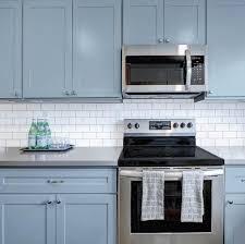 I used three coats of polycrylic to seal the deal after the cabinets were painted white. Giani Subway Tile Paint Kit Will Help You Easily Diy Your Backsplash For Under 50