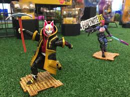 It means it changes or evolves (reacts) depending on certain things in game (damage dealt to opponents, if it's day or night.) Fortnite Action Figure From Jazwares Check Out The New Toys Dropping Into Stores This Holiday