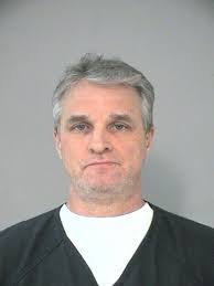 Banker's killer sentenced to life in prison