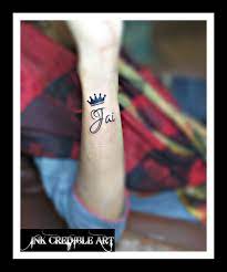 Jai Name With Crown Tattoo Design On Wrist Name Tattoo Black Tattoo Small Tattoo Crown Tatt Tattoo Designs Wrist Crown Tattoo Design Name With Crown Tattoo