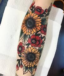 This rose tattoo, positioned at the top of the arm uses brushstroke red, against precise black squares and outlined roses to make the textured definition of. Sunflower And Rose Tattoo Ideas Novocom Top