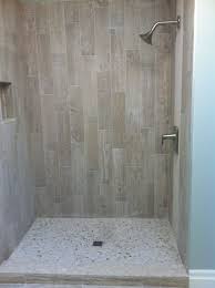 Wood Grain Tile With River Rock Wood Tile Shower Shower Tile Small Bathroom