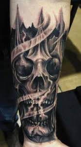 Skull tattoo by Carl Grace