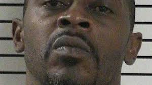 Man charged with shooting into occupied vehicle