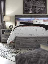 Modern bookcase headboard includes a dimming led light under the shelf. The Baystorm Storage Bedroom Collection Creative Bedroom Bedroom Storage King Storage Bed