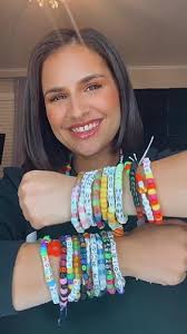 Amazon.com: nomad kandi bar collab pack LIMITED EDITION,Includes 20 rave  bracelets and exclusive necklace personally designed by Lauren Hutzel, esp.  EDC Orlando, acrylic