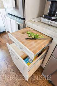 Turn your spice pullout into an efficient knife organizer and cutting board storage drawer! Kitchen Update The Final Reveal Segreto Finishes Kitchen Design Kitchen Interior Interior Design Kitchen