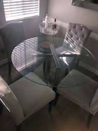 A solid wood dining set is a great centrepiece for any family dining room, while wood finished tables and chairs have the same appearance at a much more moveable weight. Cb2 Glass Dining Table With 4 Chairs Set 30501071 709202324029 Ebay