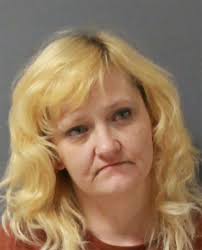 Woman wanted after absconding from custody