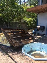 A large, usually wooden, container full of hot water in which more than one person can sit 2. Took Out An Old Hot Tub To Find An Older One Underneath 2healthbars