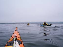 Sea kayaking with seakayakphoto.com: I saw just a flicker of respect cross  their weather beaten faces.