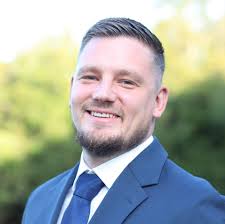 Justice White, Comparion Insurance Agent