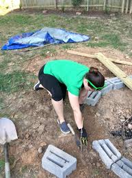 Using your mattock, shovel, or whatever digging tool you require or have, dig out the circle the circle you painted 6 deep. How To Build A Large Fire Pit In Your Backyard Ugly Duckling House