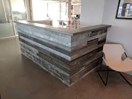 Select the plank style you like, the size desktop you need and your adjustable base. Hand Crafted Silvered Reclaimed Barnwood And Stainless Steel Reception Desk By Re Dwell Custommade Com