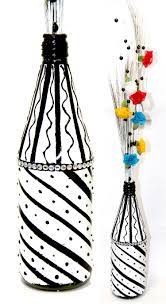 Flower Vase Made Out Of Empty Sauce Bottle With The Broom Sticks Coloured In White With Thermocol Balls And Few Flower Vase Making Colour Stick Ribbon Flowers