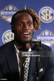 Tennessee Volunteers quarterback Joe Milton III smiles at a question...  News Photo