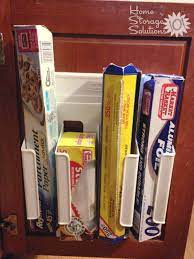 Each door swings upward and there is a cutting edge on the bottom. Aluminum Foil Plastic Bags Kitchen Wrap Storage Organization Ideas