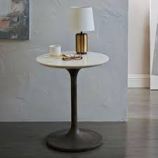 Combine an elegant interior with a glass table top to preserve the unique. White Marble Top Concrete Pedestal Side Table