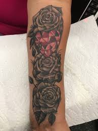 While some people want to highlight this floral design on the. Black And Grey Rose With A Red Ruby Heart Women Forearm Tattoo Forearm Tattoo Women Rose Tattoos Tattoos