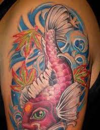 This one is just beautiful and imprints it the very way it is. Colorful Koi Fish Tattoo On Shoulder Tattooimages Biz