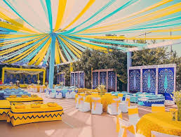 Colourful Haldi Ceremony Decor Ideas In 2020 Indian Wedding Decorations Wedding Backdrop Decorations Mehendi Decor Ideas