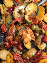 Baked Chicken Thighs With Potatoes Peppers And Olives Recipe Chicken Recipes Boneless Baked Chicken Thighs Boneless Chicken Thigh Recipes