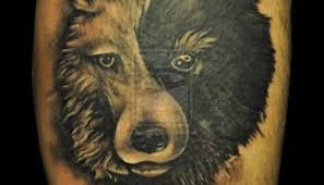 Here is a big and badass chest tattoo of a wolf or bear. Bear Tattoos Tattoofanblog