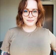 What is the identification of the snake found inside the house in Bonham,  TX?