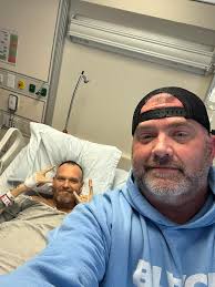 Hanging out with Chris Dorrity today at the hospital. Liver disease is  whooping him today!