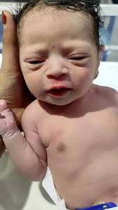 Newborn Baby Close-Up: Adorable Moments Captured