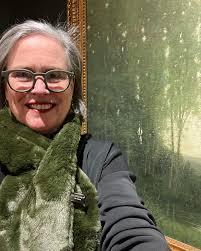 Executive Director Carey Weber celebrating #museumselfieday in our  about-to-open exhibition “Dawn & Dusk: Tonalism in Connecticut”! (She gets  extra points for matching her scarf AND glasses to Robertson Mygatt's “Edge  of the
