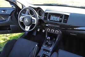 2014 Mitsubishi Lancer Evolution Driven Pictures Photos Wallpapers And Videos Top Speed Mitsubishi Lancer Mitsubishi Lancer Evolution Lancer