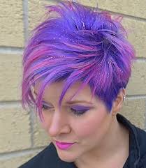 Focusing on the type of hair, the hairdresser chooses the right look for this hairstyle. Short Sassy Purple Pink Pixie Creative Hair Color Hair Styles Short Hair Styles Pixie