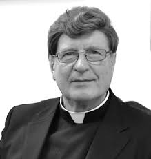 Devotion to St. John Paul II brings honor to pastor For their efforts  priests earn title of honorary Canon