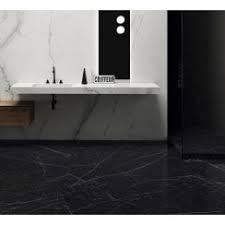 Pretty lines are carved into the marble walls and backsplash, enhancing the beauty of the bathroom. Marble Effect Tiles Porcelain Ceramic Floor Wall Tiles