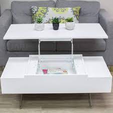 This coffee table presented is made of stainless steel and glass. Mix High Gloss Lacquer Wood Stainless Steel Legs White Lift Top Rectangular Coffee Table With Hidden Storage Buy Online In United Arab Emirates At Desertcart Ae Productid 24391895