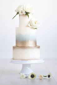 This Ombre White Blue And Gold Cake Romantic Wedding Cake Gold Wedding Cake Metallic Wedding Cakes