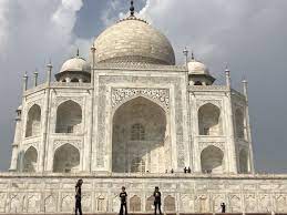 There is a domed tomb erected on an. How To Visit The Taj Mahal With Kids 5 Lost Together