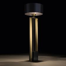 This tripod floor lamp will add a modern touch to your home decor. Gold Contemporary Designer Floor Lamp Juliettes Interiors