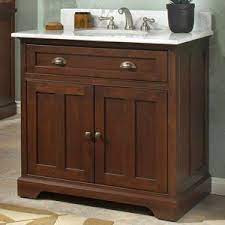 The italian marble top is a classic touch in any bathroom, while the base with its minimalist drawers and clean lines shows off a contemporary silhouette. Solid Wood Bathroom Vanities Durable Beautiful Vanities To Last A Lifetime Wood Bathroom Vanity Wooden Bathroom Vanity Small Bathroom Vanities