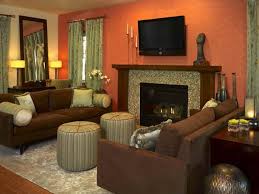7 Living Room Color Schemes Sure To Brighten Your Mood Cuethat Living Room Orange Burnt Orange Living Room Brown Living Room