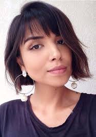 While most people cut their bangs straight, they may also shape them in an arc, leave them ragged en.wikipedia.org The Most Stunning Hairstyles Combining Short Hair With Bangs Short Haircuts Models