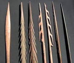 When making a spear, aboriginal men would often use fire to help straighten or harden the wood. Arthur Beau Palmer Aboriginal Spears Tiwi Ceremonial Port Keats Fighting Desert Punishment East Coast Hunting